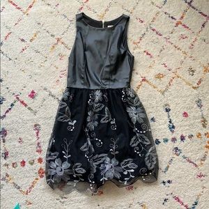 Black faux leather embroidered dress